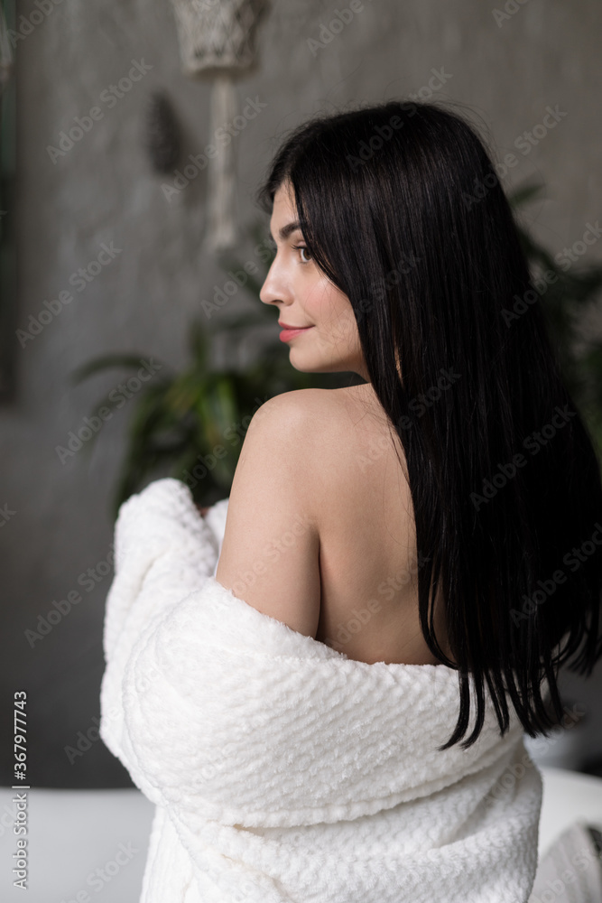 Fototapeta premium Young adult female spending free time at home