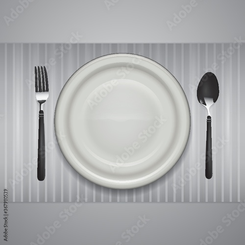 a plate with a fork and spoon