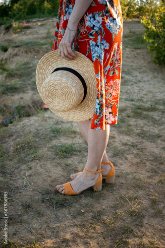 girl in red dress with hat