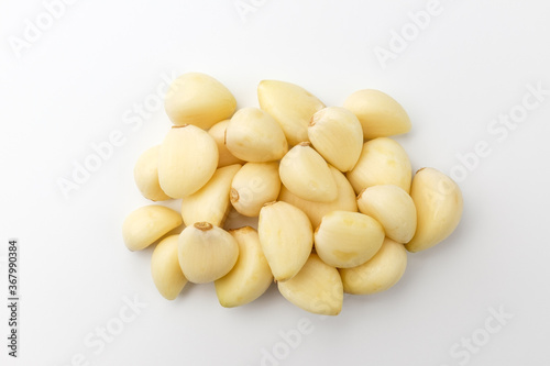 Manicured garlic on white background