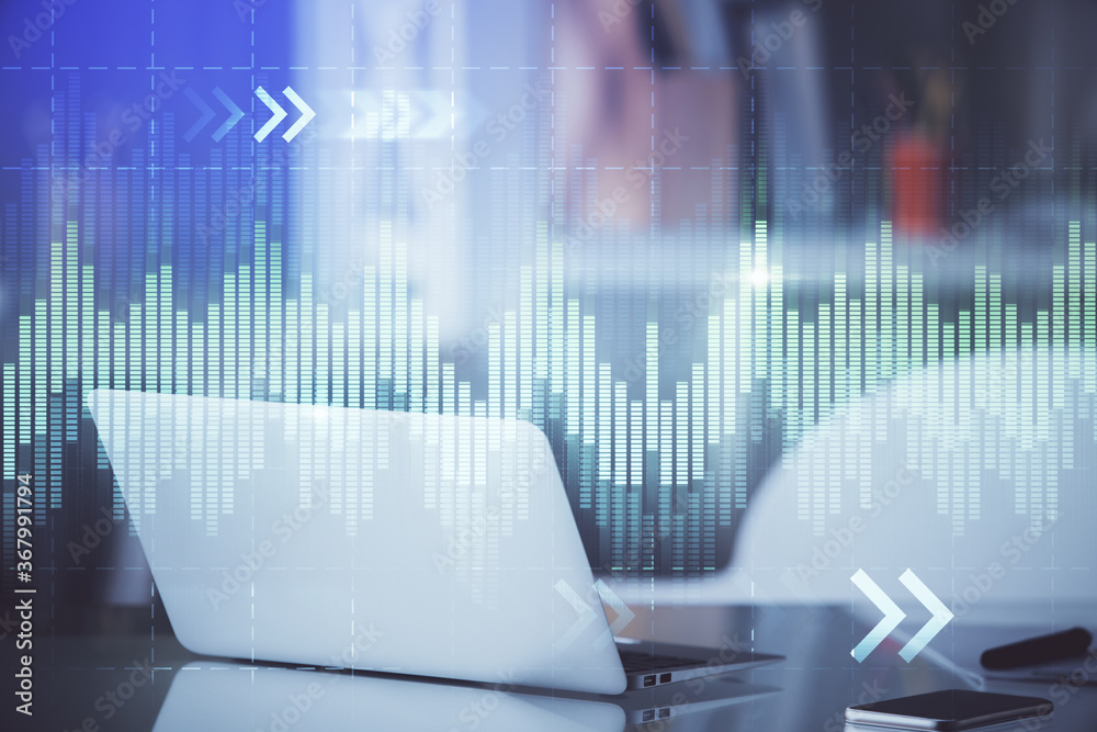 Stock market graph and table with computer background. Double exposure. Concept of financial analysis. Stock market graph and table with computer background. Double exposure. Concept of financial analysis.