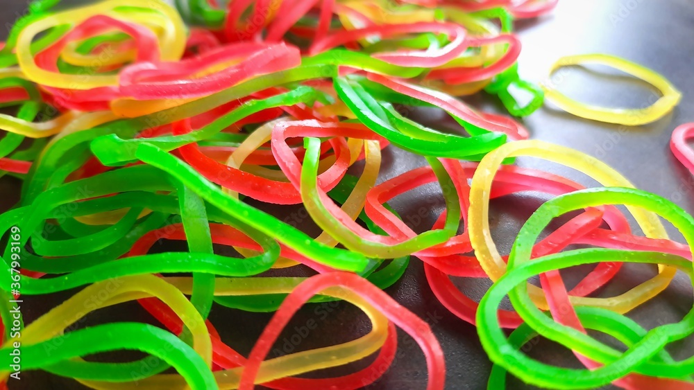 closeup of rubber bands on workspace in office selective focus