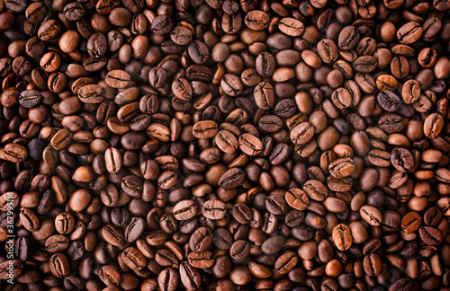 many coffee beans. focused background