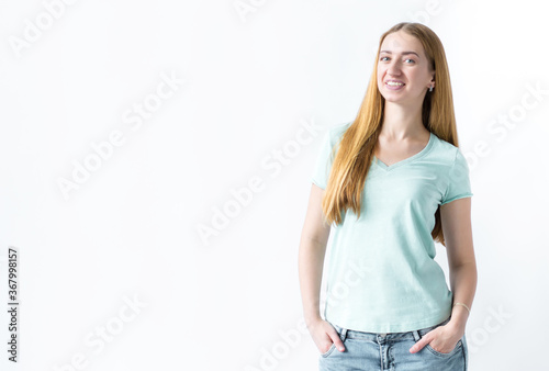 Portrait of a smiling girl on a white background
