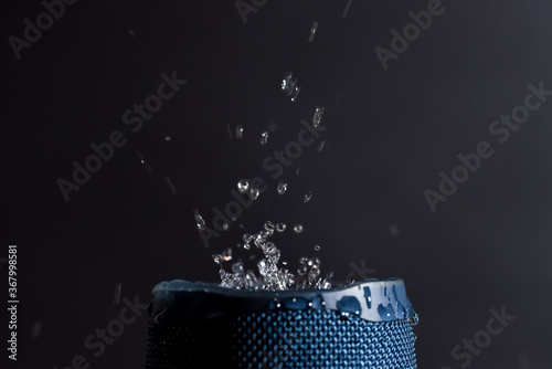 Liquid splash on a waterproof speaker