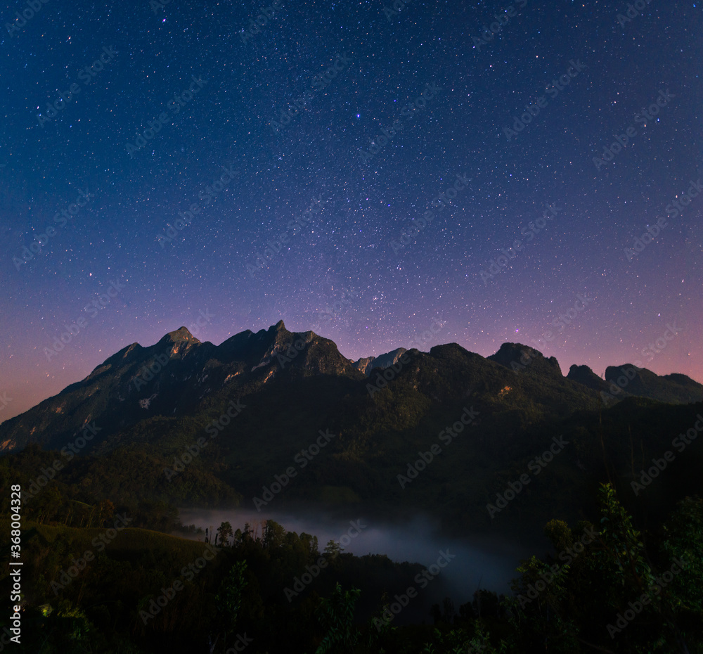 Night view of Doi Luang Chiang Dao mountain with stars on sky,The famous mountain for tourist to visit in Chiang Mai,Thailand Night view of Doi Luang Chiang Dao mountain with stars on sky,The famous mountain for tourist to visit in Chiang Mai,Thailand