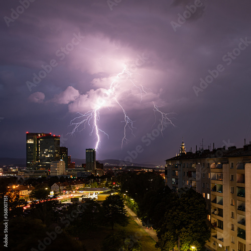 Violent summer thunderstorm with enormous lightning over the Wienerberg City in Vienna