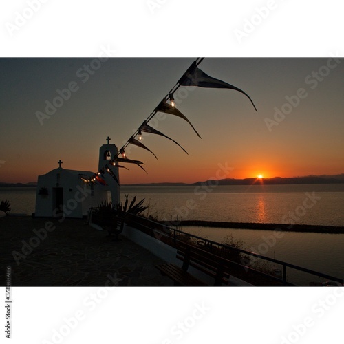 Sunrise at the Chapel of St Nicholas next to the port of Rafina 