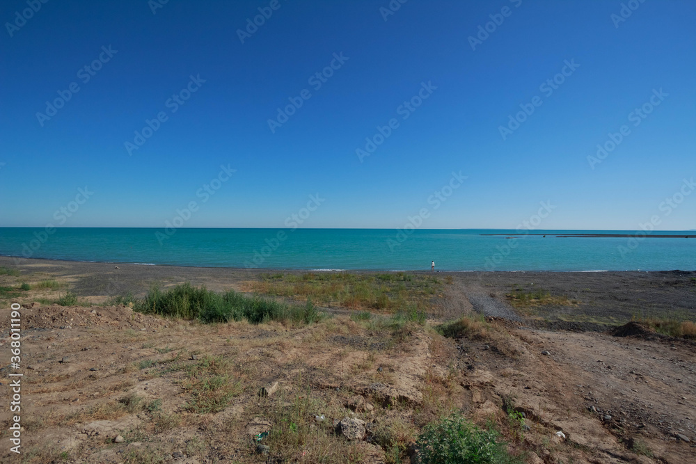 Lake Alakol, Kazakhstan. Rest on the clear blue lake. Resort place in Kazakhstan. Lake Alakol, Kazakhstan. Rest on the clear blue lake. Resort place in Kazakhstan.