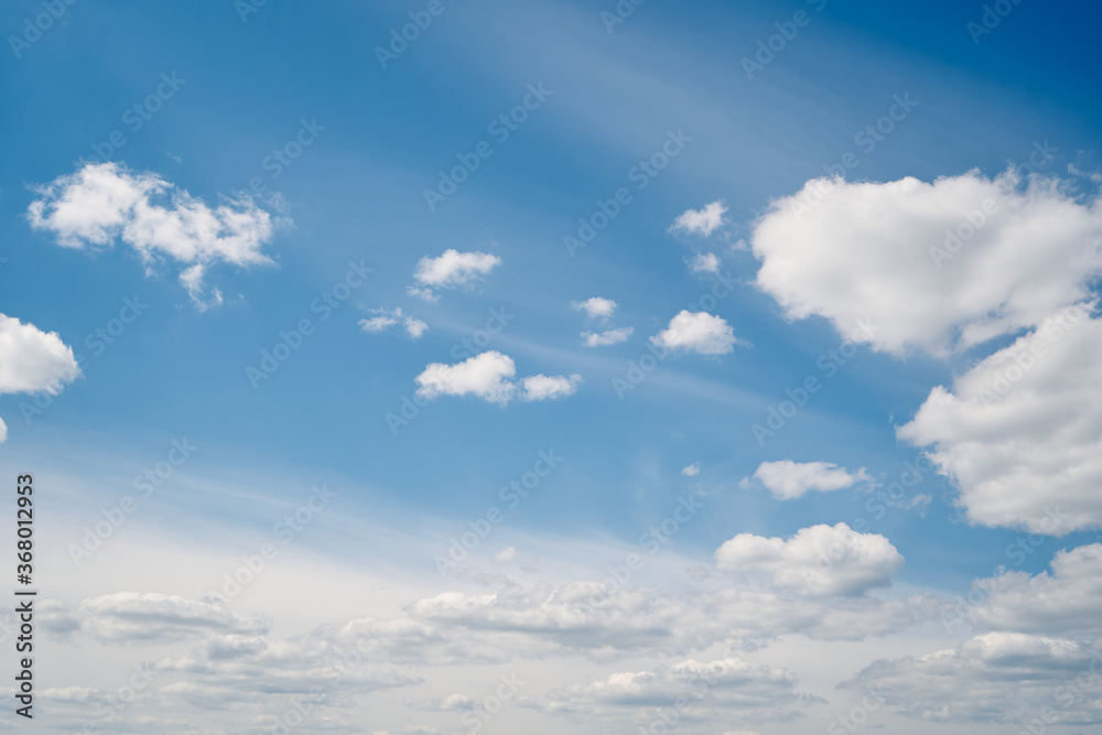Summer blue sky with fluffy white clouds. Summer blue sky with fluffy white clouds.