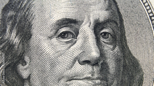 Element of American cash banknote 100 dollars. Macro photography