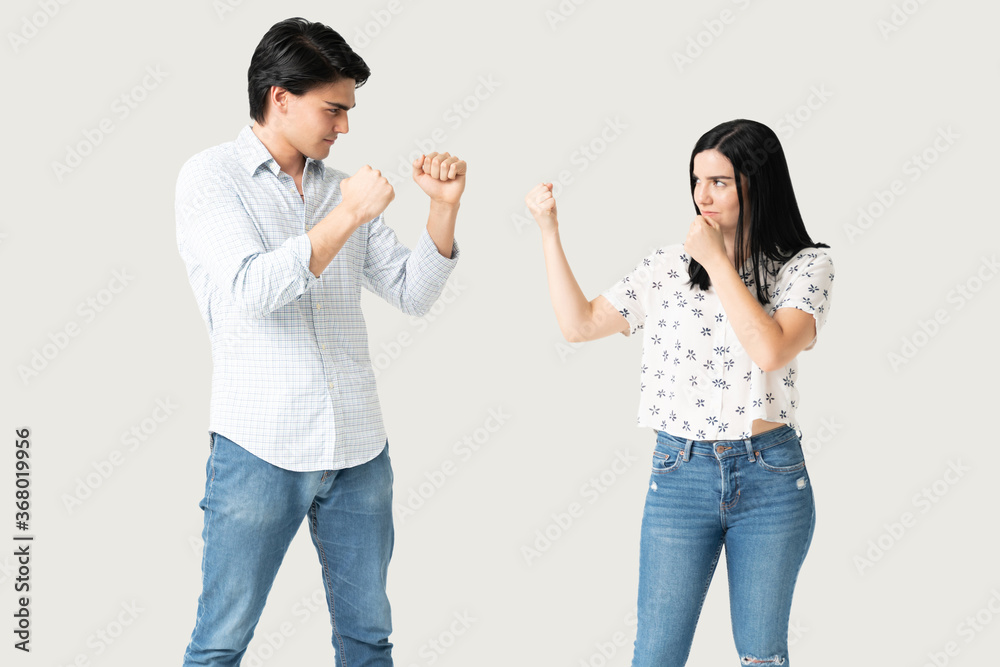 Angry Couple Standing With Fist Defense Gesture Angry Couple Standing With Fist Defense Gesture