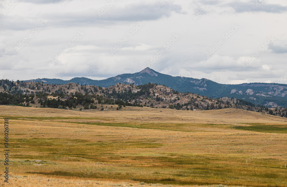 mountain landscape with blue sky and clouds