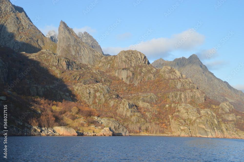 Autumn colors in the mountains and fjords of the Lofoten islands in Norway
