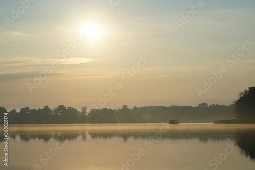 Morning fog at lake Paelitzsee, Mecklenburg lake district. 