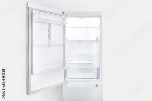 Empty open fridge interior