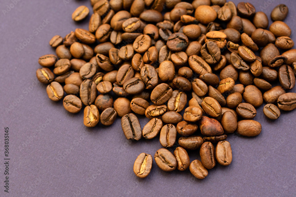 coffee beans texture on a purple background for text or design coffee beans texture on a purple background for text or design