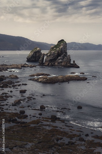 Beautiful shot of Biscay, Rocas San Juan de Gaztelugatxe Gaztelugatxeko in Spain photo