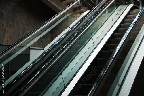 Escalator inside modern shopping center