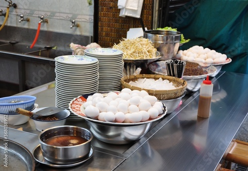 A small Taiwan eatery shop, where ingredients are on display and orders prepared in front of patrons.