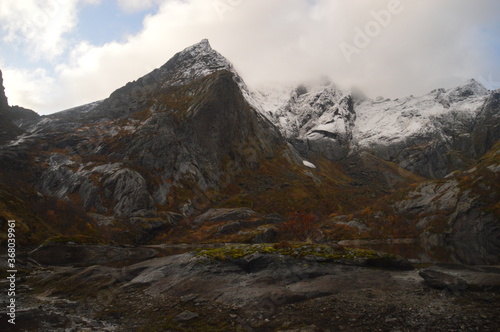 Fototapeta Naklejka Na Ścianę i Meble -  Colorful autumn refelctions and colors in the mountains on the beautiful fjords of Lofoten in Norway