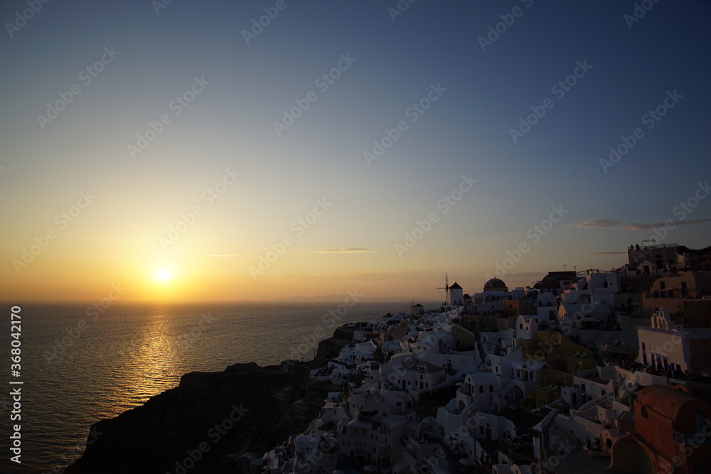 Beautiful sunset view of Santorini island, Oia, Greece, Europe