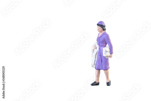 Close up of Miniature people isolated with clipping path on white background.Elegant Design with copy space for placement your text, mock up for business and travel concept.