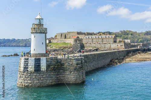 View from sea of Castle Cornet. Castle Cornet has guarded Saint Peter Port for 800 years. Saint Peter Port - capital of Guernsey, British Crown dependency in English Channel off coast of Normandy. photo