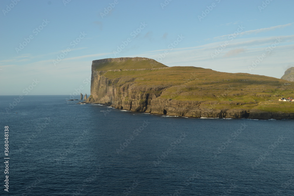 The dramatic and mystical landscapes on the coast and mountains of the Faroe Islands