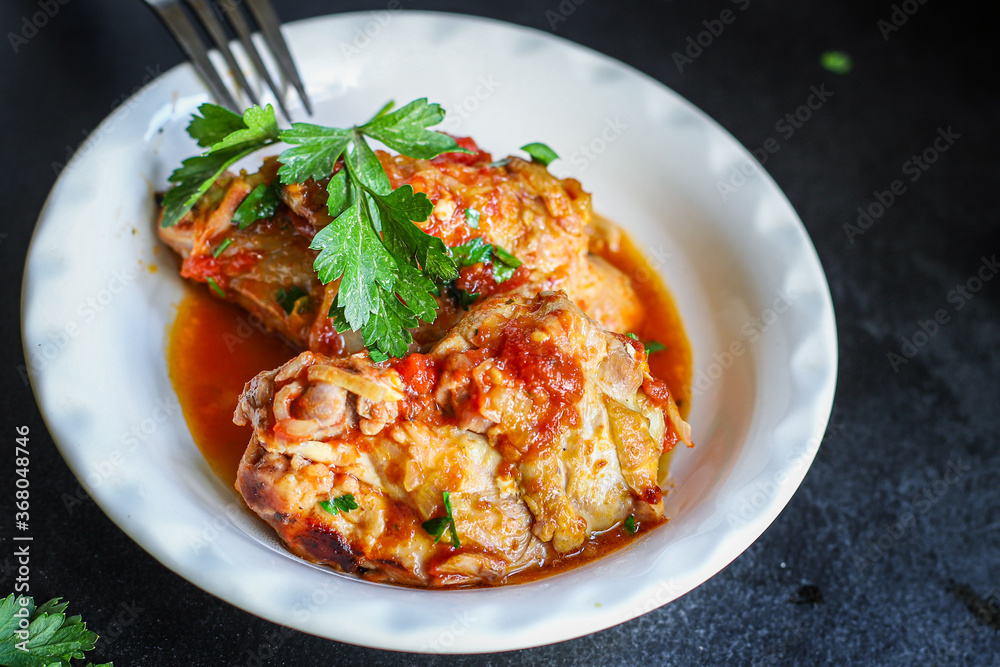 chicken in tomato sauce piece of vegetables chunk fried chakhokhbili or chashushuli second course food background top view copy space for text organic eating healthy chicken in tomato sauce piece of vegetables chunk fried chakhokhbili or chashushuli second course food background top view copy space for text organic eating healthy