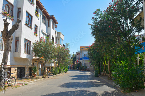 A quiet residential street in Buyukada, one of the Princes' Islands, also known as Adalar, in the Sea of Marmara off the coast of Istanbul, Turkey.  © dragoncello