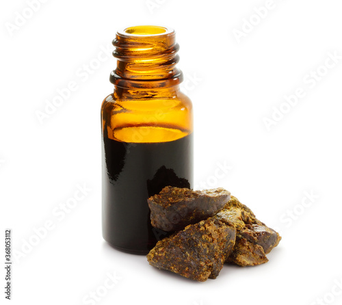 Photos Bees Propolis Medicianal Ingredient with Tincture Extract in the Bottle Isolated on White
