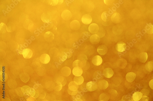 Golden bokeh background, Abstract background bokeh blurred, Shiny bokeh light effect.