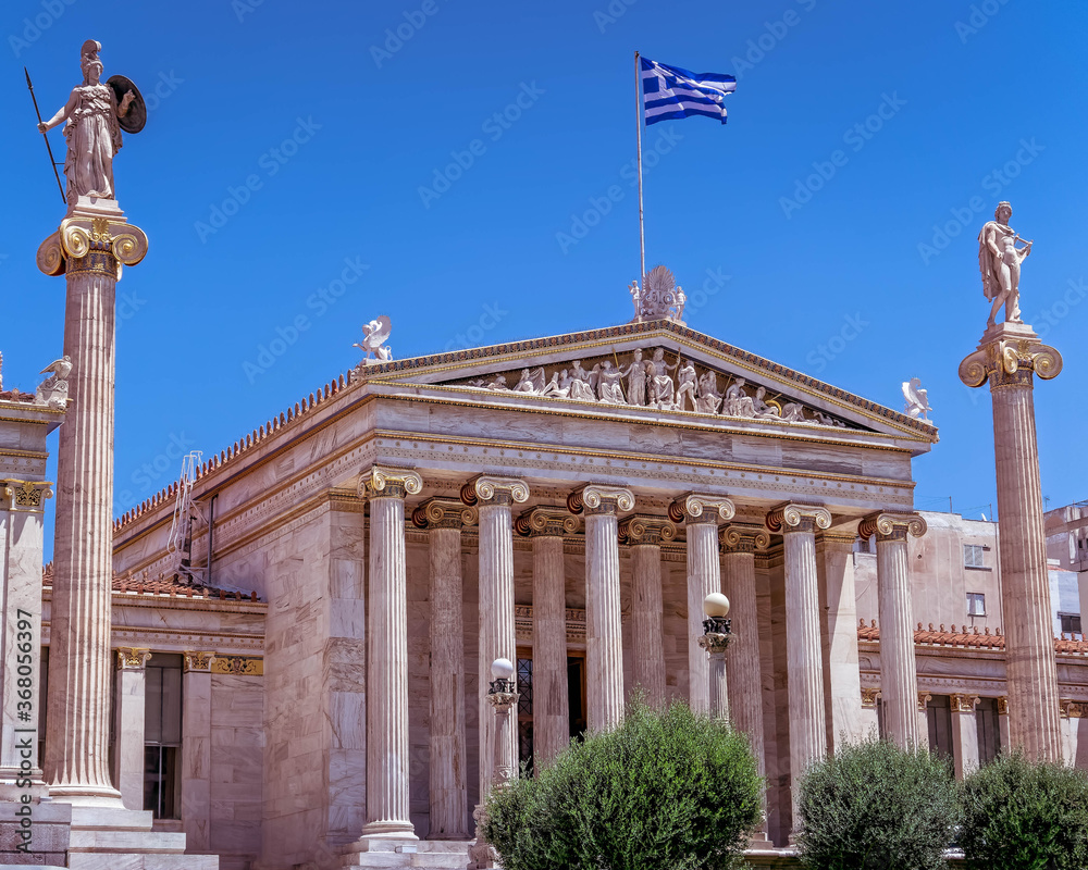 Obraz premium Athens Greece, the national academy lassical building white marble facadewith Athena and Apollo statues