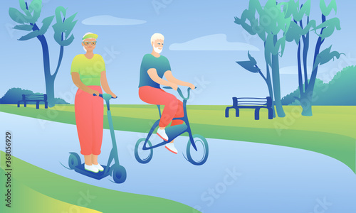Stylish grandmother riding an electric scooter in the park with a fashionable grandfather on a bicycle. An elderly husband and wife ride on the street. Active lifestyle concept.