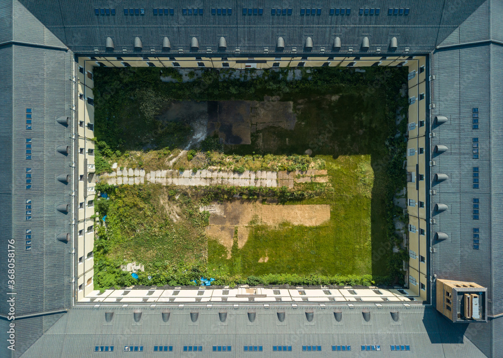 Aerial drone top view. The courtyard of a rectangular house in Kiev.