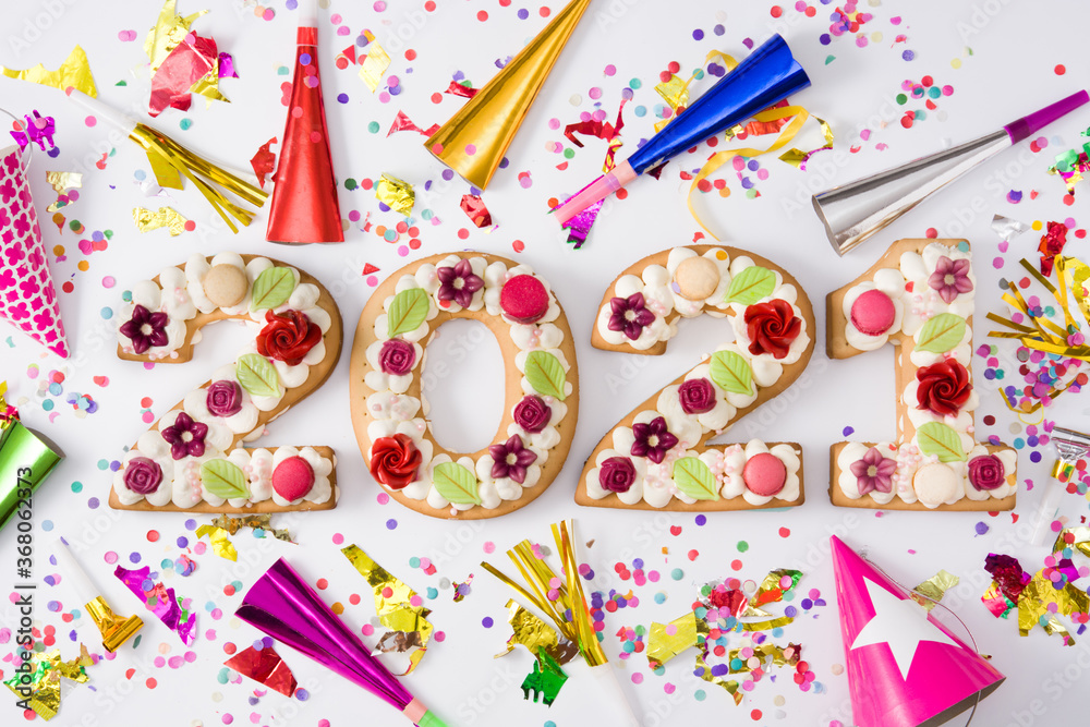 2021 cake and ornaments isolated on white background. New year concept. 2021 cake and ornaments isolated on white background. New year concept.