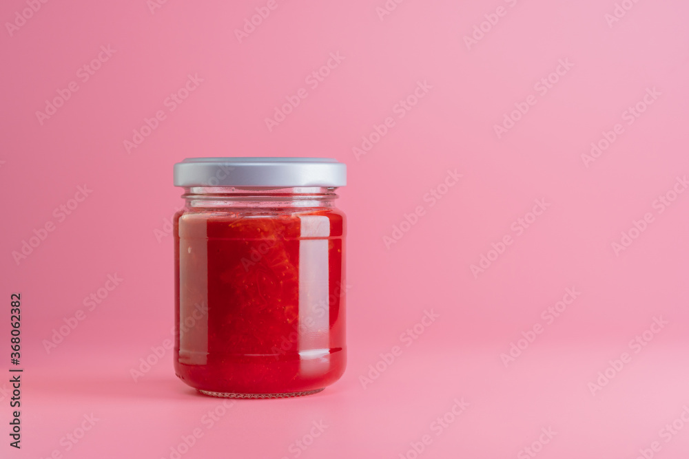 close up of Strawberry jam jar mockup isolated on pink background