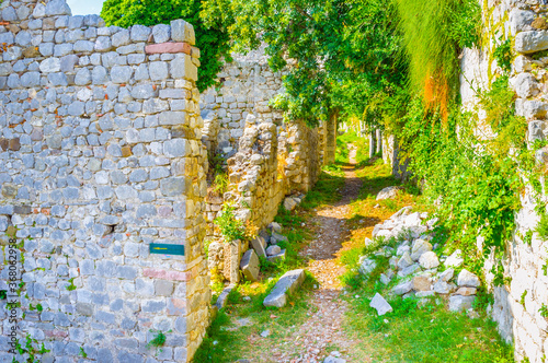 The medieval street of ruinet town in Stari Bar, Montenegro photo