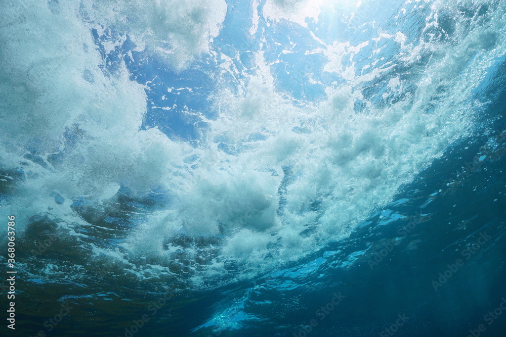 Underwater sea foam made by wave breaking seen from below water surface, natural scene,  Mediterranean sea