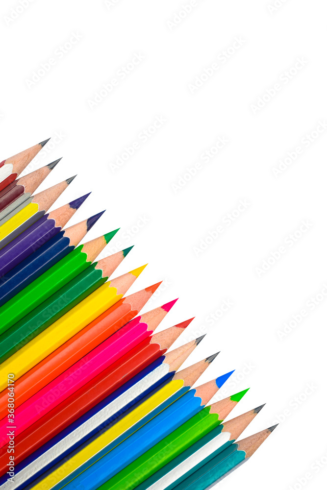 Angle line of different colored wood pencil crayons placed on a white background Angle line of different colored wood pencil crayons placed on a white background
