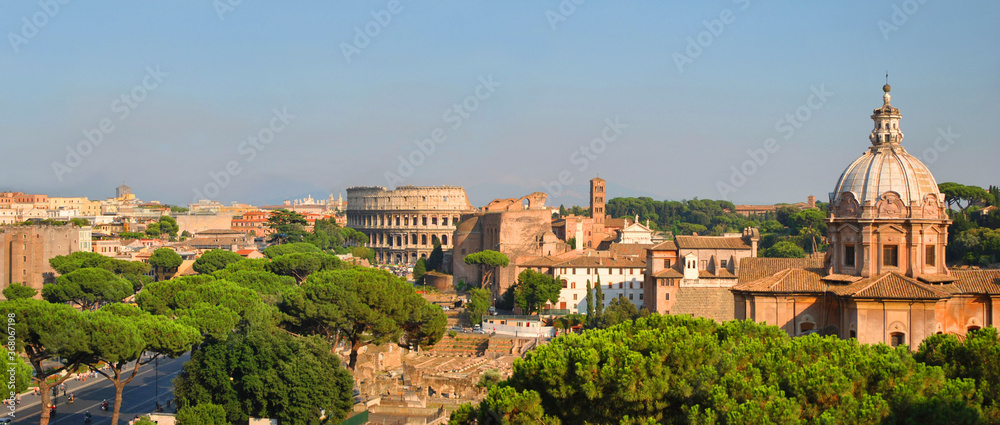 Divine view on ancient roman landmark and famous travel destinations such as the Colosseum and the excavated Roman Forum from the Altar of the Fatherland.