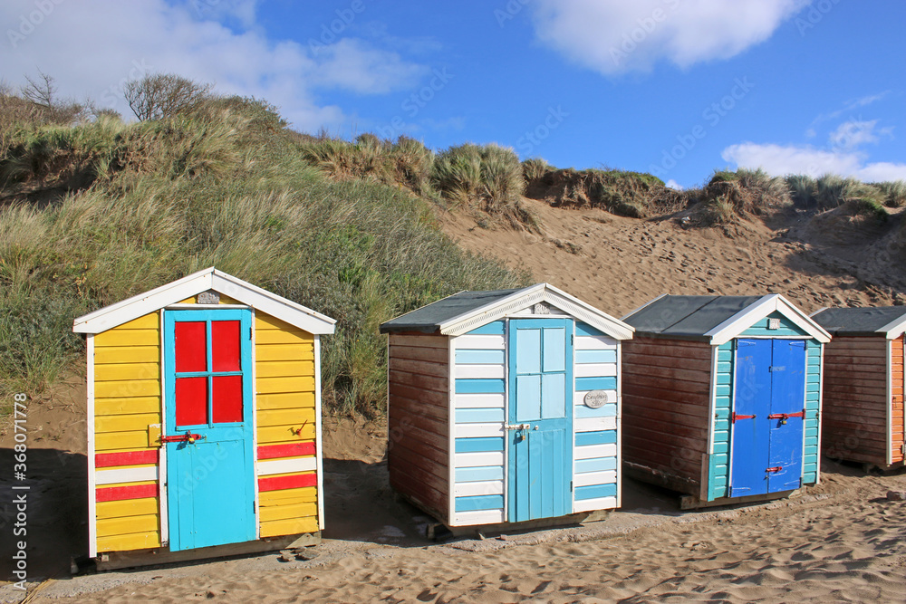 Beach huts at Saunton Sands beach, Devon