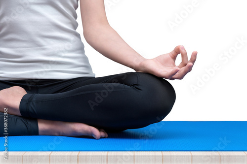 Asian woman keep calm and meditates while practicing yoga to explore the Inner Peace. Yoga and meditation have good benefits for health.