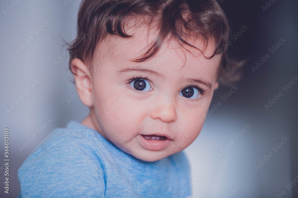 portrait of a baby boy with long hair portrait of a baby boy with long hair