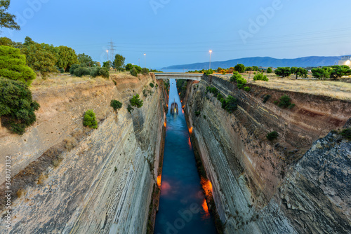 The Corinth Canal at evening.The Corinth Canal connects the Gulf of Corinth with the Saronic Gulf in the Aegean Sea.It separates the Peloponnese from the Greek mainland.