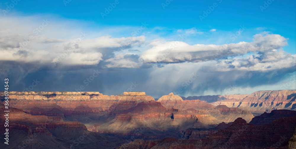 view to grand canyon in sunset with fog