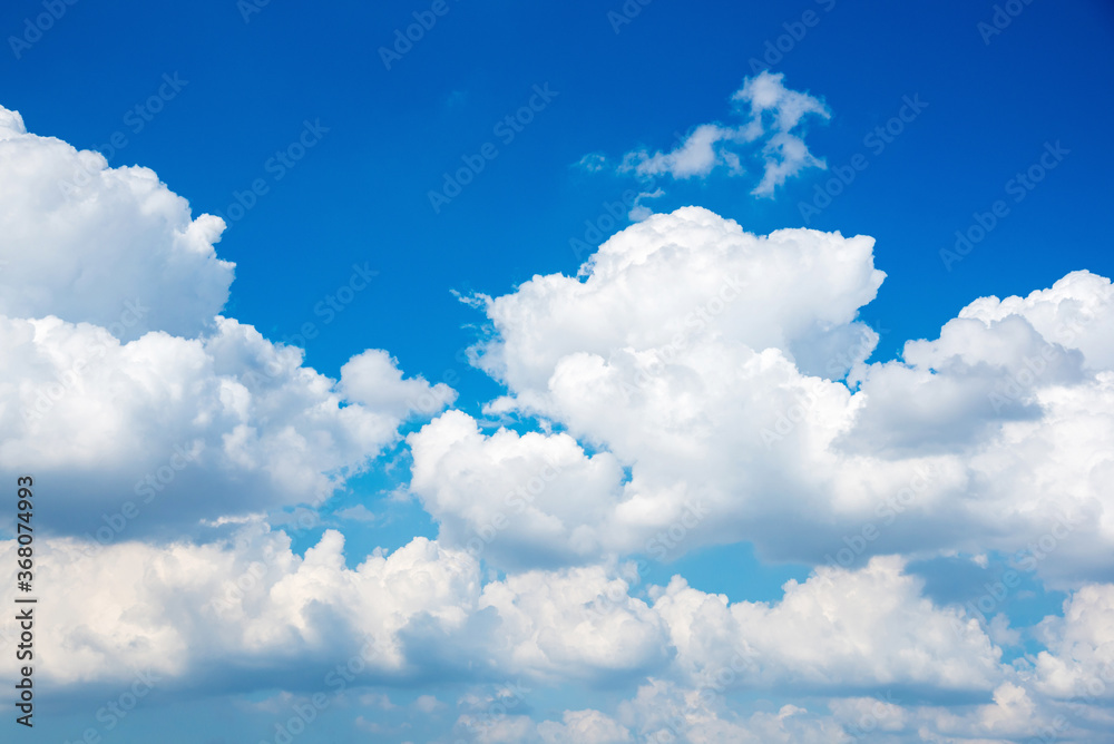 Beautiful Nature white cloud scape and blue sky background in daytime at summer season Beautiful Nature white cloud scape and blue sky background in daytime at summer season