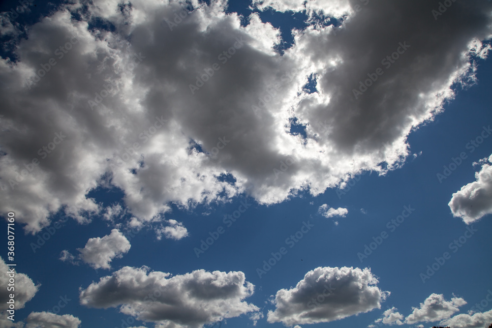 Obraz premium Beautiful summer blue sky with clouds.