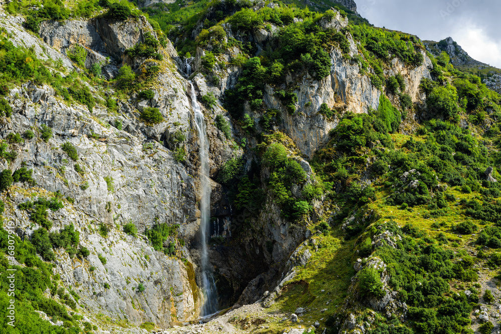 Waterfalls of Tzoumerka. One of two picturesque waterfalls in the mountains of a national park in eastern Tzoumerka, in the vicinity of the village of Kriopigi. Greece Waterfalls of Tzoumerka. One of two picturesque waterfalls in the mountains of a national park in eastern Tzoumerka, in the vicinity of the village of Kriopigi. Greece